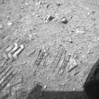 The image shows a close-up of track marks left by NASA's Curiosity rover. Image courtesy of NASA/JPL-Caltech